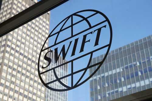 Подробности SWIFT объявила о партнерстве с блокчейн-консорциумом R3 | INFBusiness